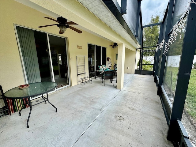 view of patio featuring ceiling fan