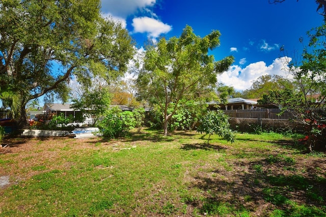 view of yard featuring fence