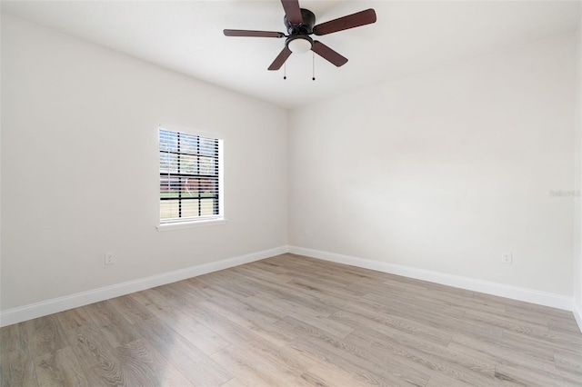 unfurnished room with ceiling fan and light hardwood / wood-style flooring