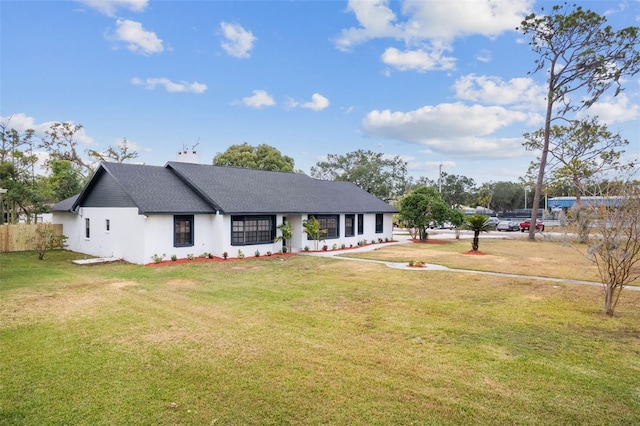 view of front of house with a front lawn