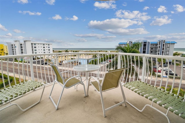 balcony featuring a water view