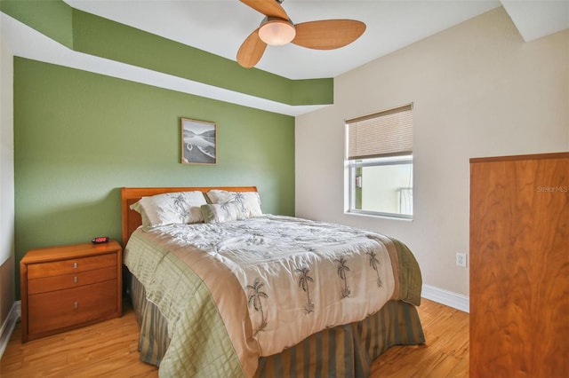 bedroom featuring ceiling fan and light wood-type flooring