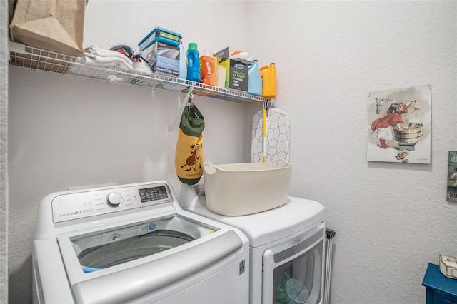 laundry area featuring washer and clothes dryer