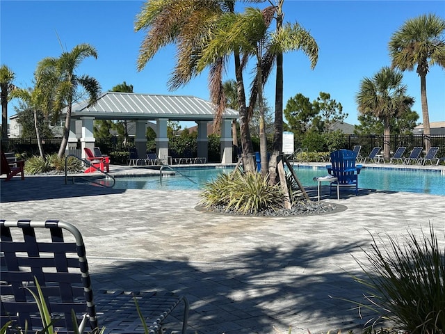 view of pool featuring a gazebo and a patio