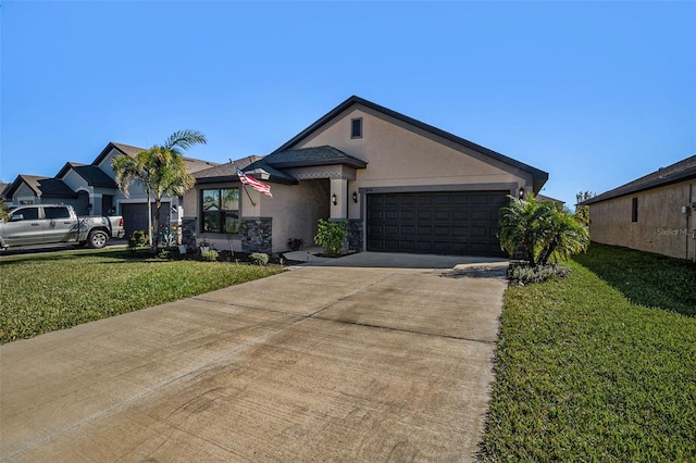 view of front of house featuring a garage and a front yard