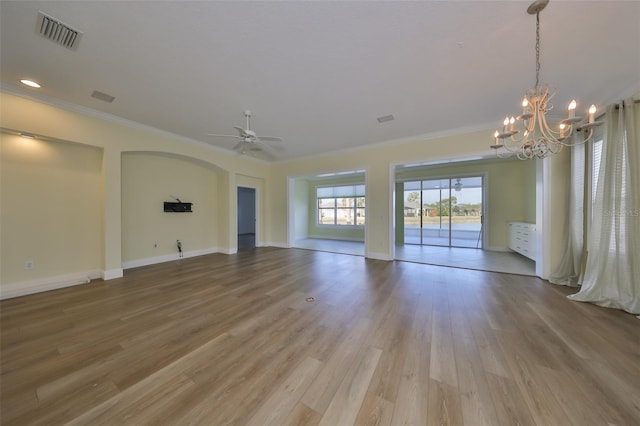 unfurnished living room with ceiling fan with notable chandelier, ornamental molding, and light hardwood / wood-style flooring