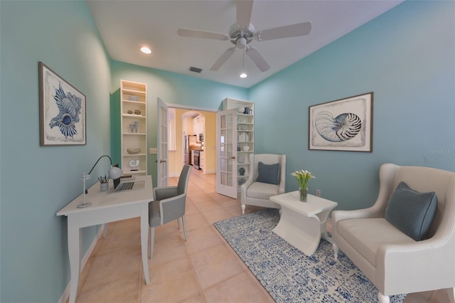 tiled office featuring ceiling fan