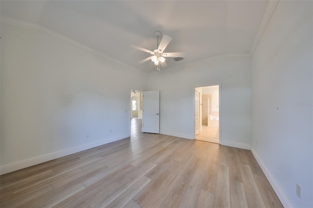 spare room featuring ceiling fan, ornamental molding, and light hardwood / wood-style flooring