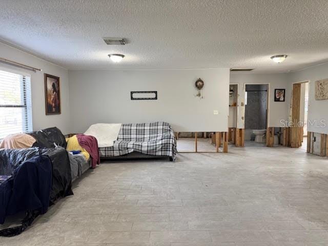 living room featuring a textured ceiling