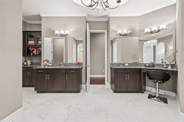 bathroom featuring vanity and ornamental molding