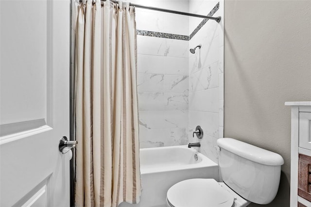 full bathroom featuring shower / bath combination with curtain, vanity, and toilet