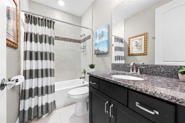 full bathroom with tile patterned flooring, shower / bath combination with curtain, vanity, and toilet