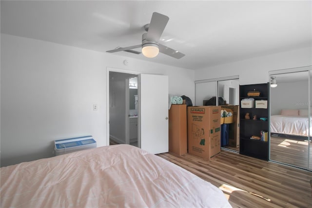 bedroom with hardwood / wood-style flooring and ceiling fan