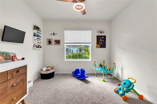 rec room featuring ceiling fan and carpet floors