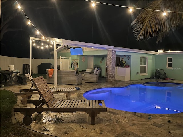 view of pool featuring an outdoor living space and a patio