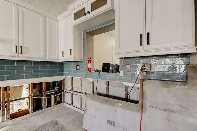 kitchen featuring white cabinets