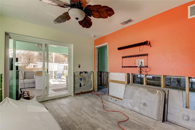 living room featuring ceiling fan