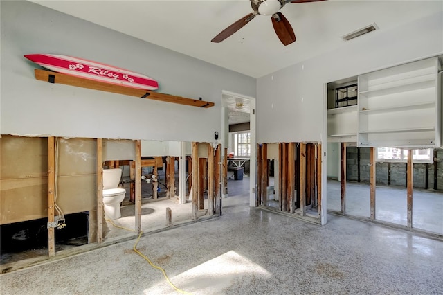 miscellaneous room featuring ceiling fan and plenty of natural light