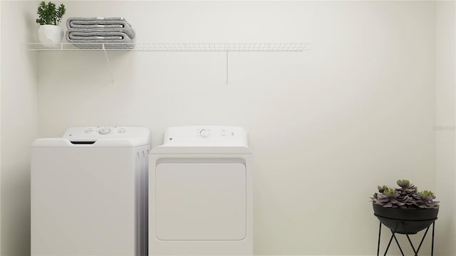 laundry area with washer and dryer