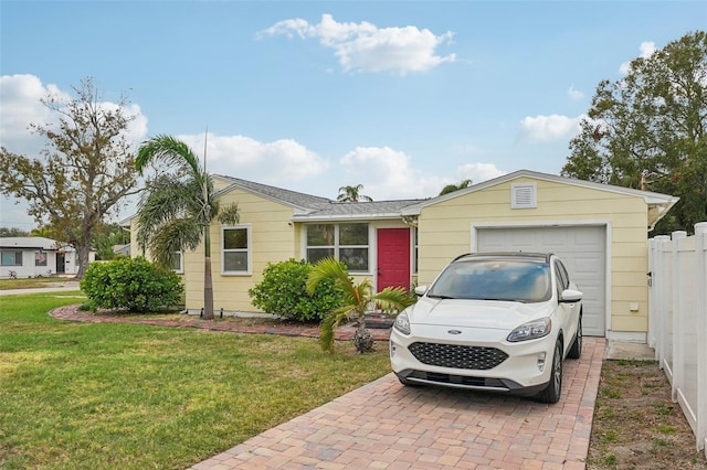 ranch-style home with a front lawn