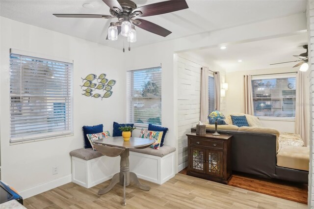 dining space featuring breakfast area and light hardwood / wood-style floors