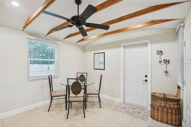 tiled dining area featuring vaulted ceiling with beams and ceiling fan