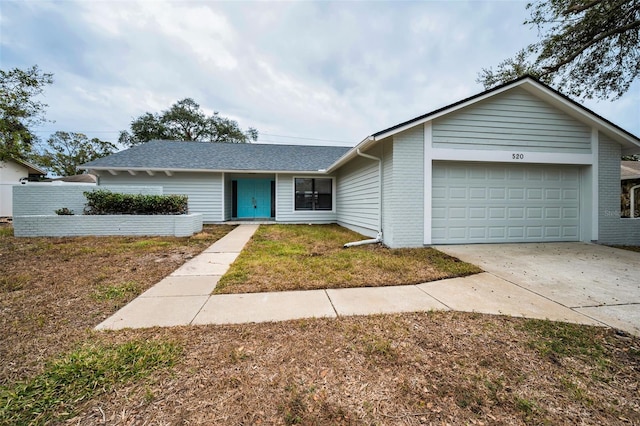 ranch-style home with a garage