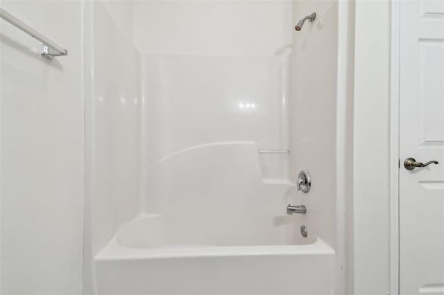 bathroom with shower / bathing tub combination