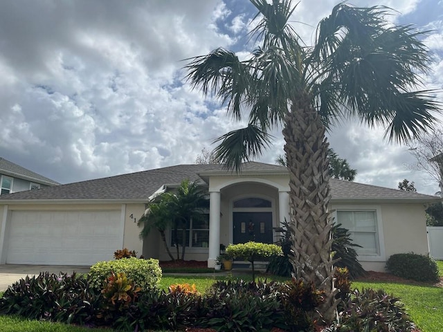 view of front of property featuring a garage