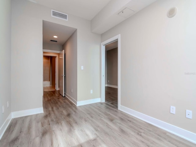 1120 E Kennedy Blvd Unit 927, Tampa, FL 33602 - unfurnished room with wood finished floors and baseboards