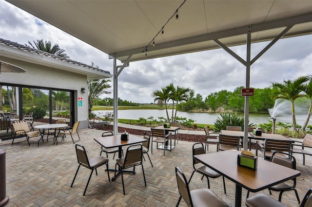 view of patio / terrace with a water view