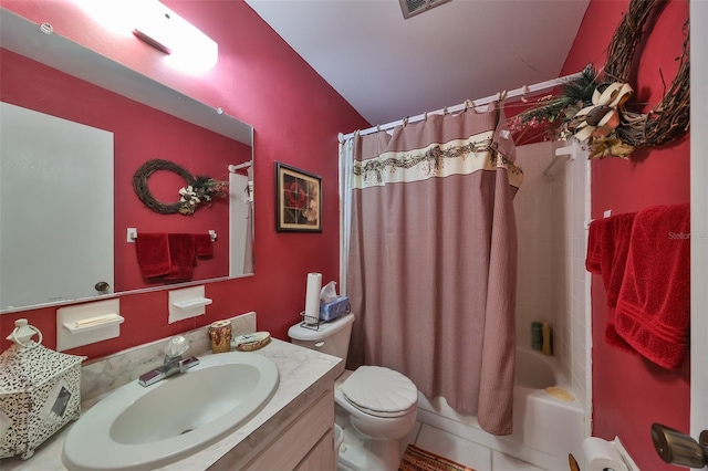 full bathroom featuring toilet, shower / tub combo, vanity, and vaulted ceiling