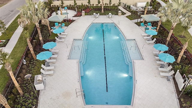 view of swimming pool with a patio