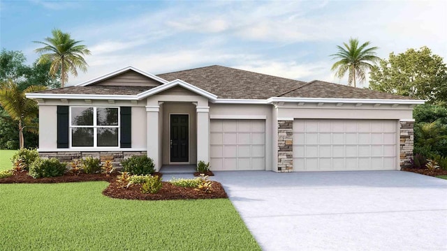 view of front facade with a front yard and a garage