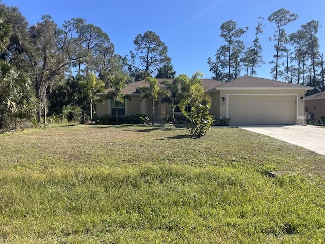 single story home featuring a garage and a front lawn