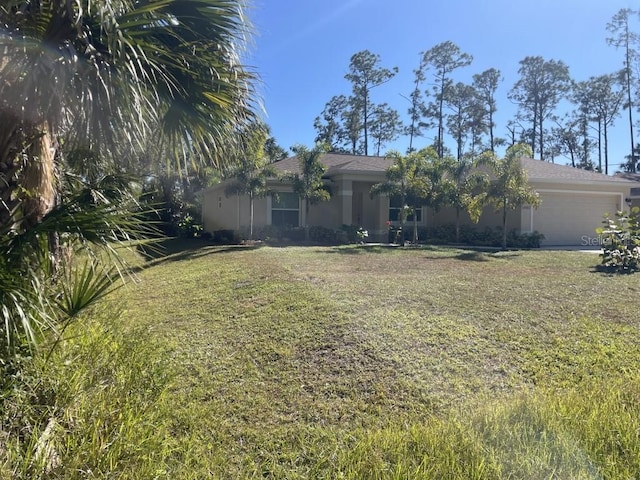 view of yard featuring a garage