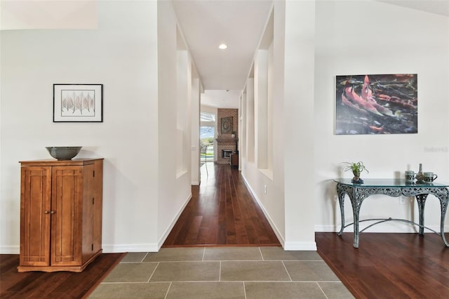 corridor with dark tile patterned floors