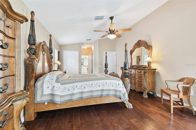 bedroom featuring vaulted ceiling, dark hardwood / wood-style floors, and ceiling fan