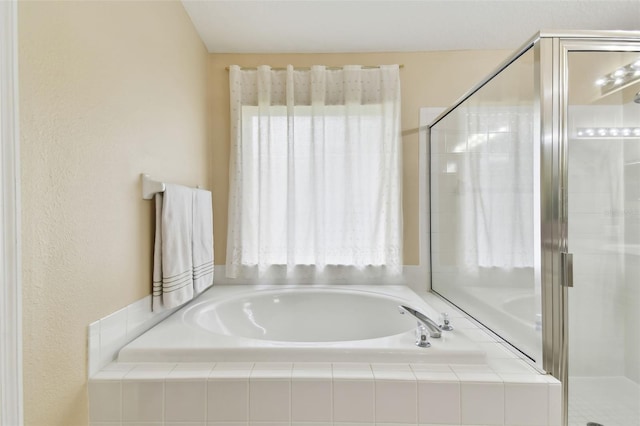 bathroom with independent shower and bath