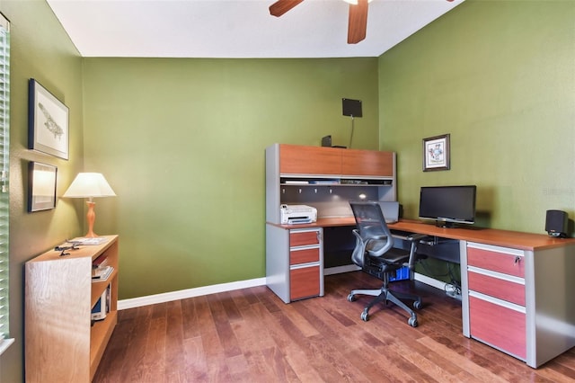 office featuring ceiling fan, lofted ceiling, and light wood-type flooring