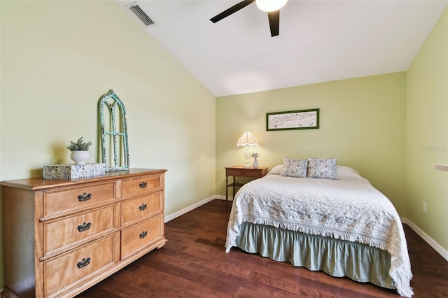 bedroom featuring vaulted ceiling, ceiling fan, and dark hardwood / wood-style flooring