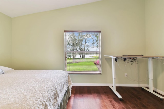 bedroom featuring dark hardwood / wood-style floors