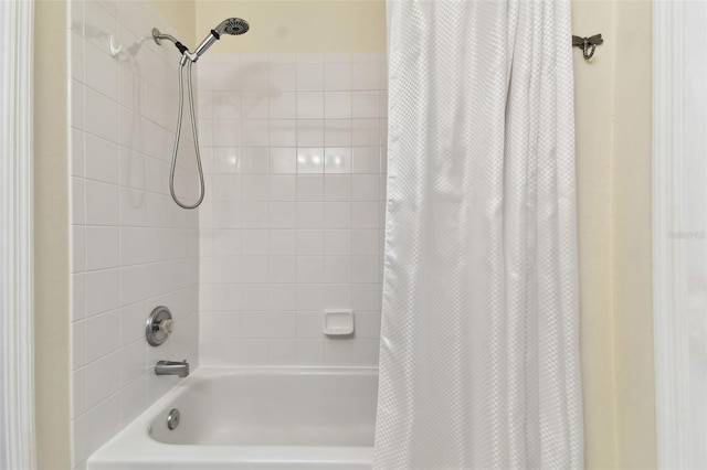 bathroom featuring shower / tub combo with curtain