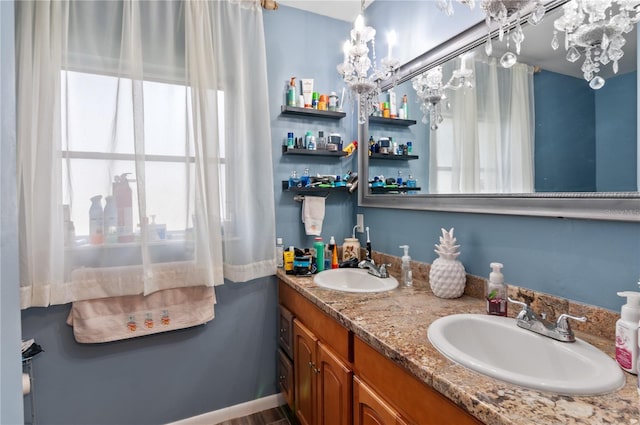 bathroom featuring vanity and a wealth of natural light