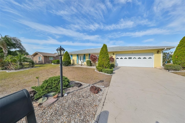 ranch-style home with a garage