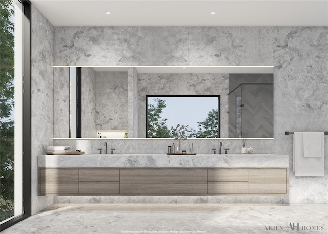 bathroom featuring vanity and plenty of natural light