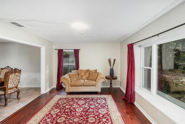 living room featuring dark hardwood / wood-style floors