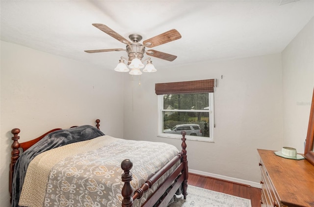 bedroom featuring hardwood / wood-style floors and ceiling fan