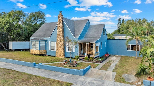 view of front of home with a front yard