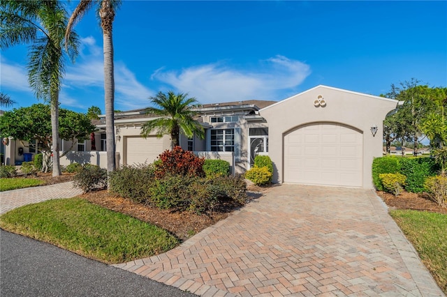 view of front of property with a garage